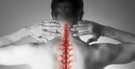 Image with the back of a man and spinal cord representation